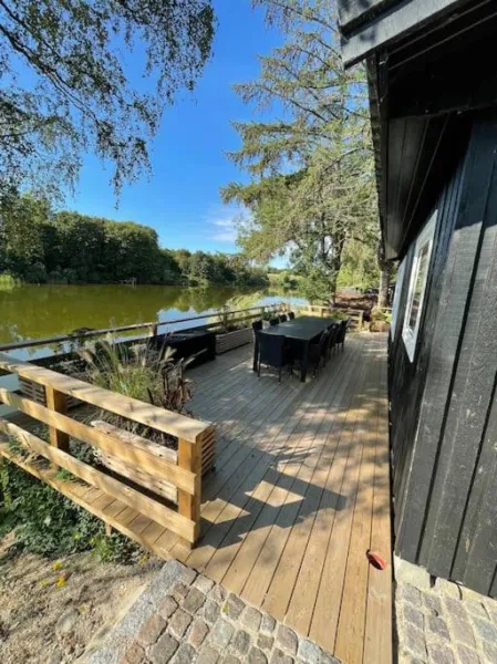 Billede 9 af Hyggelig sommerhus. med udsigt, til vand fra senge