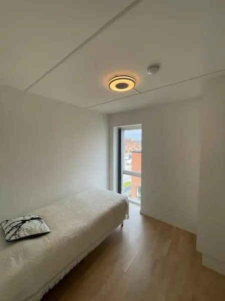 Billede 3 af Central og rolig lejlighed med gratis parkering