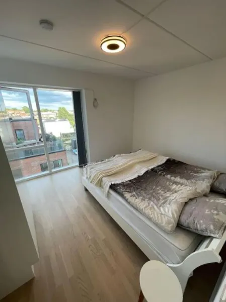 Billede 20 af Central og rolig lejlighed med gratis parkering